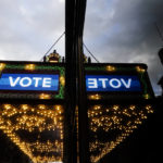 
              A marquee in downtown Atlanta displays the word "vote" on Election Day, Tuesday, Nov. 8, 2022, in Atlanta. (AP Photo/Brynn Anderson)
            