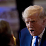 
              FILE - Former President Donald Trump speaks to guests at Mar-a-lago on Nov. 8, 2022, in Palm Beach, Fla. An executive at Trump’s company testified Monday, Nov. 14 that he was afraid he’d hear those famous words — “you’re fired!” — if he went to the big boss with concerns that two top company officials were scheming to dodge taxes on company-paid perks. (AP Photo/Andrew Harnik, File)
            