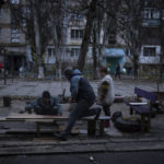 
              Residents do repair works on a recently damaged building during a Russian strike in the southern city of Kherson, Ukraine, Sunday, Nov. 27, 2022. Shelling by Russian forces struck several areas in eastern and southern Ukraine overnight as utility crews continued a scramble to restore power, water and heating following widespread strikes in recent weeks, officials said Sunday. (AP Photo/Bernat Armangue)
            