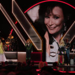 
              Carrie Underwood, from left, Reba McEntire and Miranda Lambert perform a tribute to the late singer Loretta Lynn, pictured on screen, during the 56th Annual CMA Awards on Wednesday, Nov. 9, 2022, at the Bridgestone Arena in Nashville, Tenn. (AP Photo/Mark Humphrey)
            