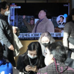 
              A TV screen shows an image of North Korean leader Kim Jong Un during a news program at the Seoul Railway Station in Seoul, South Korea, Saturday, Nov. 19, 2022. North Korean leader Kim Jong Un said the test of a newly developed intercontinental ballistic missile confirmed that his country has another "reliable and maximum-capacity" weapon to contain outside threats, as he warned the United States and its allies that their alleged provocative steps would lead to "their self-destruction," state media reported Saturday. (AP Photo/Ahn Young-joon)
            