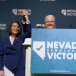 
              Sen. Catherine Cortez Masto, D-Nev., left, reacts alongside Nevada Gov. Steve Sisolak during an election night party hosted by the Nevada Democratic Party, Tuesday, Nov. 8, 2022, in Las Vegas. (AP Photo/Gregory Bull)
            