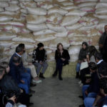 USAID chief Samantha Power, center, speaks with farmers during her visit to an animal fodder processing plant in the eastern city of Zahleh, Lebanon, Wednesday, Nov. 9, 2022. Power announced that the United States will give $80.5 million in aid for food assistance and solar-powered water pumping stations in the crisis-battered country of Lebanon. (AP Photo/Bilal Hussein)
