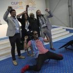 
              From left, Wess, Raya Salter, Valencia Gunder known by most as Vee, Dominic Bednar and AY Young pose for photos at the COP27 U.N. Climate Summit, Wednesday, Nov. 16, 2022, in Sharm el-Sheikh, Egypt. (AP Photo/Peter Dejong)
            