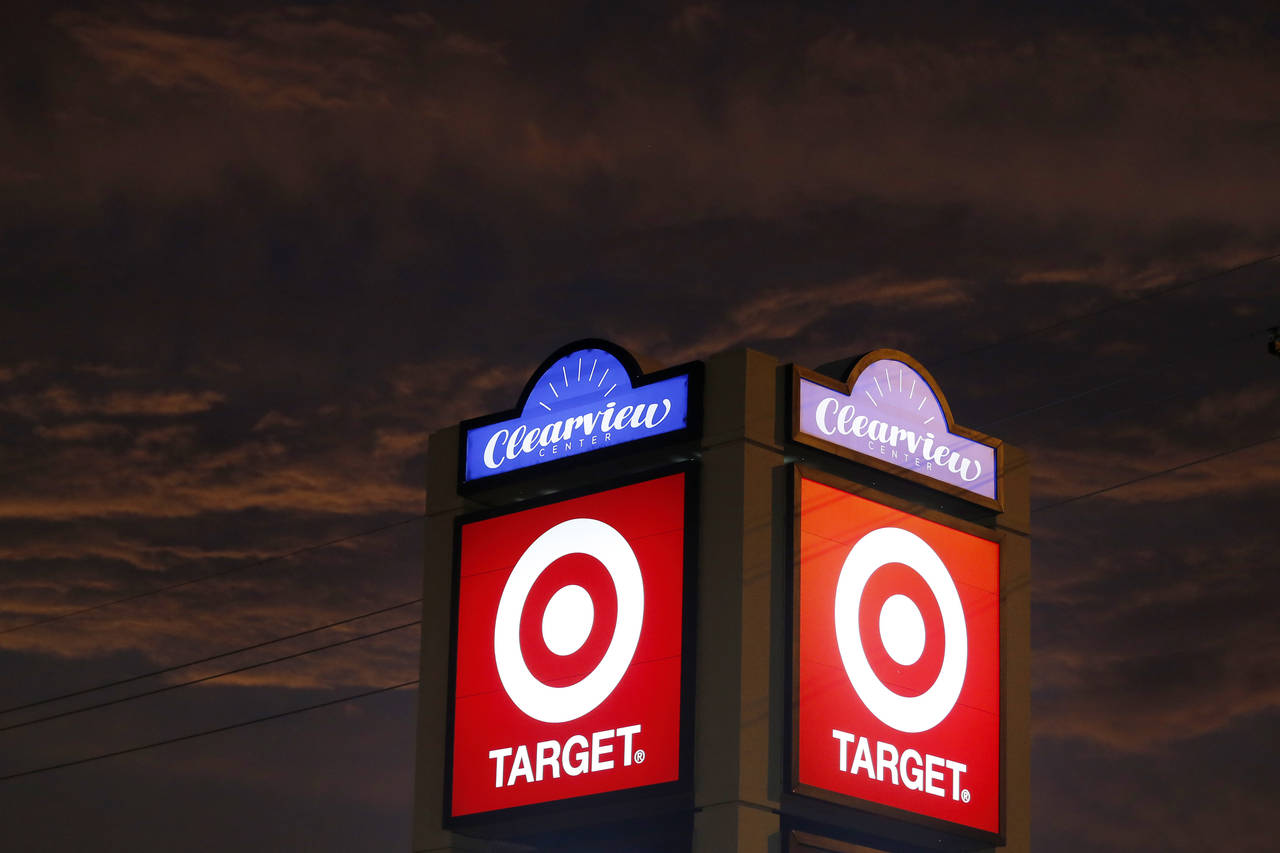 FILE - Signage for Target is shown in Metairie, La., Thursday, Aug. 15, 2019. Target reports quarte...