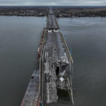 
              General view of the damaged Antonivsky Bridge in Kherson, Ukraine, Sunday, Nov. 27, 2022. The bridge, the main crossing point over the Dnipro river in Kherson, was destroyed by Russian troops in earlier November, after Kremlin's forces withdrew from the southern city. (AP Photo/Bernat Armangue)
            