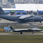 
              In this photo released by Xinhua News Agency, A J-20 stealth fighter jet, foreground, taxis with a YU-20 aerial tanker while a training for the upcoming 14th China International Aviation and Aerospace Exhibition in Zhuhai in southern China's Guangdong province on Nov. 5, 2022. China is displaying its latest generation fighter jets and civilian aircraft this week as it looks to carve a larger role for itself in the global arms trade and compete with Boeing and Airbus. (Yu Hongchun/Xinhua via AP)
            