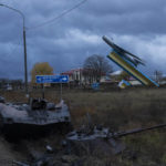
              A destroyed armoured vehicle lies at the entrance of Kherson, southern Ukraine, Wednesday, Nov. 16, 2022. (AP Photo/Bernat Armangue)
            