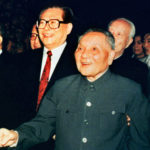 
              FILE - In this photo provided by China's Xinhua News Agency, then Chinese leader Deng Xiaoping, center, meets delegates of the Communist Party Central Committee in Beijing on Oct. 19, 1992. Then Communist Party General Secretary Jiang Zemin is seen at left. With his death, former Chinese leader Jiang leaves behind a very different China than the one he tried to shape. Now it’s Xi Jinping’s nation. (Xinhua News Agency via AP)
            