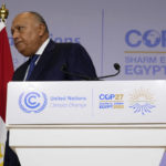 
              Sameh Shoukry, president of the COP27 climate summit, leaves after speaking at the summit, Saturday, Nov. 19, 2022, in Sharm el-Sheikh, Egypt. (AP Photo/Peter Dejong)
            