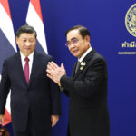 
              Chinese President Xi Jinping, left, meets with Thailand's Prime Minister Prayuth Chan-ocha, on the sidelines of the Asia-Pacific Economic Cooperation, APEC summit, at the Government House, Saturday, Nov. 19, 2022, in Bangkok, Thailand. (Athit Perawongmetha/Pool Photo via AP)
            