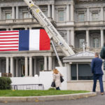 
              American and French flags are in place on the Old Executive Office Building on the White House campus Tuesday, Nov. 29, 2022, in Washington, in advance of the State Visit by French President Emmanuel Macron. (AP Photo/Andrew Harnik)
            