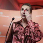 
              Denmark's Prime Minister and head of the the Social Democratic Party Mette Frederiksen reacts before given a speech during the country's general election night at the party's office in Copenhagen, Denmark, Tuesday, Nov. 1, 2022. (Nikolai Linares/Ritzau Scanpix via AP)
            