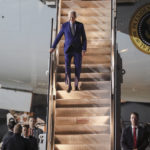 
              U.S. President Joe Biden disembarks Air Force One upon arrival to attend the G20 Summit at the Ngurah Rai International Airport in Bali, Indonesia, Sunday, Nov. 13, 2022. (Made Nagi/Pool Photo via AP)
            