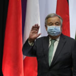 
              United Nations Secretary General Antonio Guterres waves after speaking ahead of the G20 Summit in Bali, Indonesia, Monday, Nov. 14, 2022. (AP Photo/Achmad Ibrahim)
            