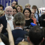 
              Frans Timmermans, executive vice president of the European Commission, center left, speaks to members of the media at the COP27 U.N. Climate Summit, Saturday, Nov. 19, 2022, in Sharm el-Sheikh, Egypt. (AP Photo/Peter Dejong)
            