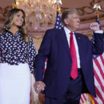 Former President Donald Trump stands on stage with former first lady Melania Trump after he announced a run for president for the third time as he speaks at Mar-a-Lago in Palm Beach, Tuesday, Nov. 15, 2022. (AP Photo/Andrew Harnik)
