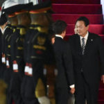 
              South Korean President Yoon Suk Yeol arrives at Ngurah Rai International Airport in Bali, Indonesia, Sunday, Nov. 13, 2022. President Yoon Suk Yeol is planning to attend the G20 summit meeting in Nusa Dua. (Sonny Tumbelaka/Pool Photo via AP)
            