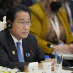 FILE - Japan's Prime Minister Fumio Kishida listens to a speech during the ASEAN - East Asia Summit in Phnom Penh, Cambodia on Nov. 13, 2022. The United States and its two top Asian allies have been working quietly on the sidelines of this week's Group of 20 meetings in Bali, Indonesia, to raise the issue of North Korea's growing aggressiveness and build a broader coalition of like-minded states to help maintain international pressure on it. (AP Photo/Vincent Thian, File)