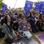 
              Demonstrators participate in a sit-in calling for reparations for loss and damage at the COP27 U.N. Climate Summit, Thursday, Nov. 17, 2022, in Sharm el-Sheikh, Egypt. (AP Photo/Peter Dejong)
            