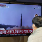 
              A TV screen showing a news program reporting about North Korea's missile launch with file footage is seen at the Seoul Railway Station in Seoul, South Korea, Thursday, Nov. 3, 2022. North Korea continued its barrage of weapons tests on Thursday, firing at least three missiles including a suspected intercontinental ballistic missile that forced the Japanese government to issue evacuation alerts and temporarily halt trains. (AP Photo/Lee Jin-man)
            