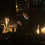 
              A man sits in a caffe during a blackout in Kyiv, Ukraine, Friday, Nov. 4, 2022. (AP Photo/Andrew Kravchenko)
            
