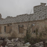 
              Vadym Zherdetsky stands in the remains of his house destroyed by fighting, in the village of Moshun, outside Kyiv, Ukraine, Friday, Nov. 4, 2022. When Russia invaded Ukraine in February, two missiles struck Zherdetsky's home in the tiny village of Moschun on the outskirts of the capital, Kyiv, ripping the roof off and nearly killing four of his family members. (AP Photo/Andrew Kravchenko)
            