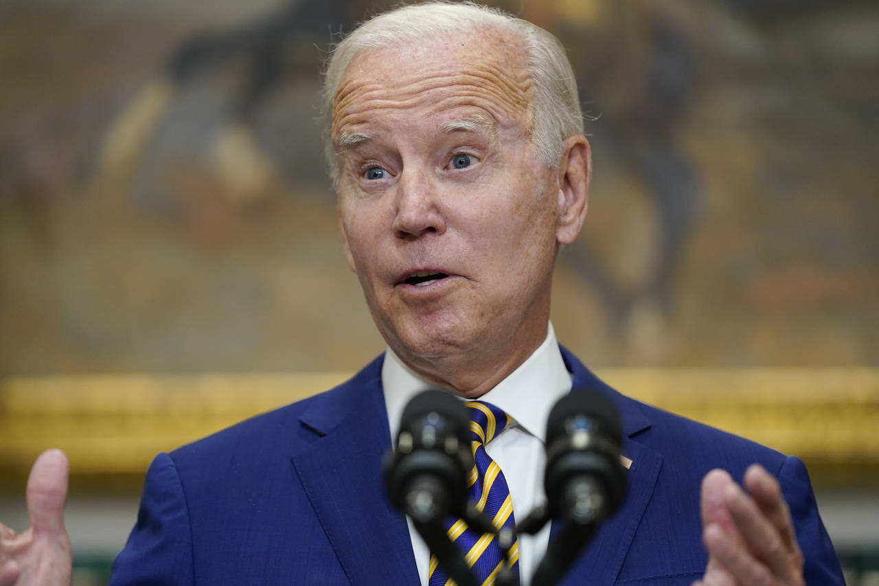 FILE - President Joe Biden speaks about student loan debt forgiveness in the Roosevelt Room of the ...