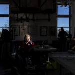 
              Supervisor Lou-Ann LaPorte looks on as a voter leaves the Aspray Boat House polling site after casting a ballot in the midterm election in Warwick, R.I., Tuesday, Nov. 8, 2022. (AP Photo/David Goldman)
            