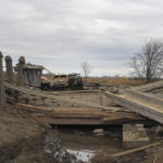 
              A destroyed bridge is seen after recent battles near Kherson, Ukraine, Wednesday, Nov. 16, 2022. The Russian retreat from Kherson marked a triumphant milestone in Ukraine's pushback against Moscow's invasion almost nine months ago. (AP Photo/Efrem Lukatsky)
            