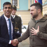 
              In this photo provided by the Ukrainian Presidential Press Office, Ukrainian President Volodymyr Zelenskyy, right, shakes hands with British Prime Minister Rishi Sunak during their meeting in Kyiv, Ukraine, Saturday, Nov. 19, 2022. (Ukrainian Presidential Press Office via AP)
            