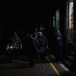 
              Ukrainians board the Kherson-Kyiv train at the Kherson railway station, southern Ukraine, Saturday, Nov. 26, 2022. Fleeing shelling, hundreds of civilians on Saturday streamed out of the southern Ukrainian city whose recapture they had celebrated just weeks earlier. (AP Photo/Bernat Armangue)
            