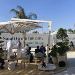 
              Visitors relax outside the Saudi Green Initiative forum near the COP27 climate conference venue, Friday, Nov. 11, 2022, in Sharm el-Sheikh, Egypt. (AP Photo/Kelvin Chan)
            