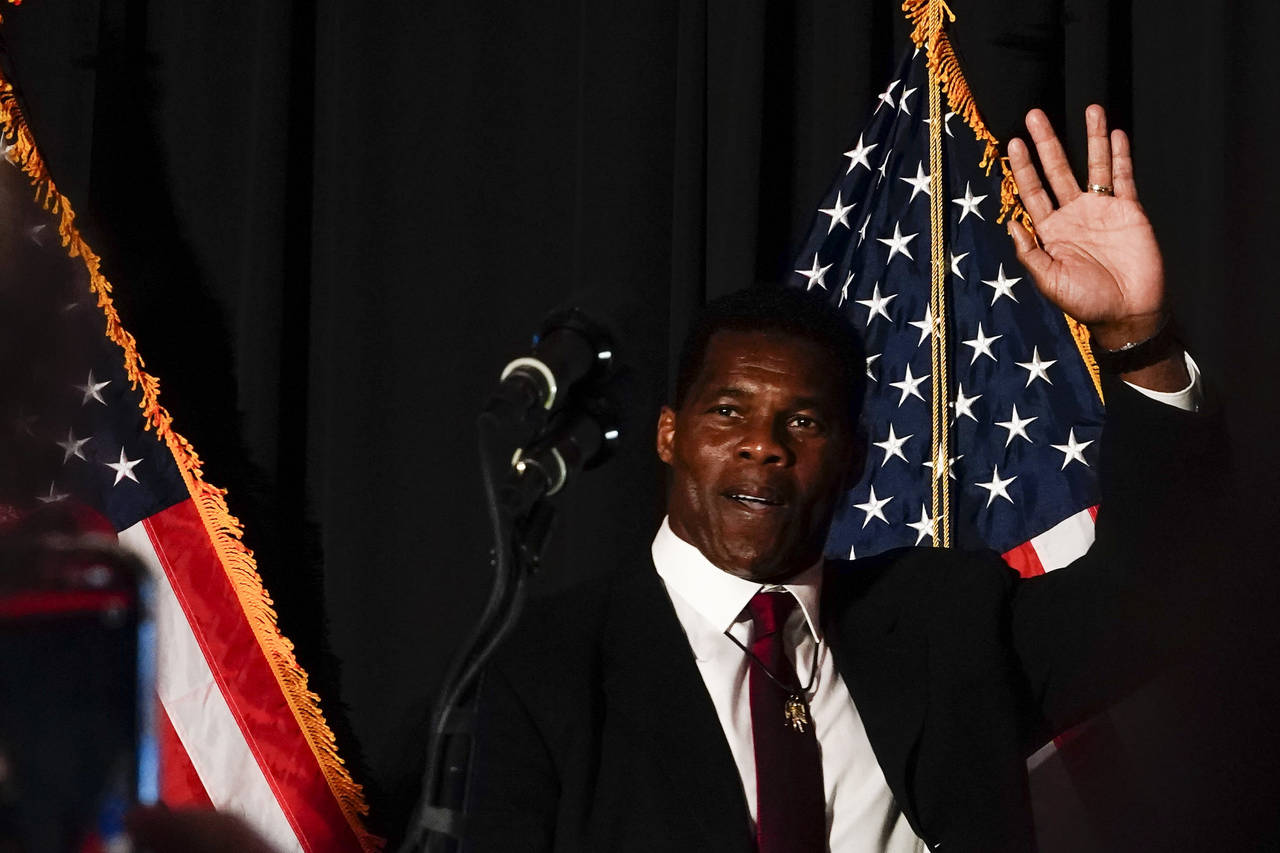 Republican U.S. Senate candidate Herschel Walker speaks during an election night watch party on Tue...