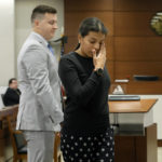 
              Ines Hixon, wipes away tears as she leaves the podium with her husband, Tommy Hixon, after she gave a victim impact statement during the sentencing hearing for Marjory Stoneman Douglas High School shooter Nikolas Cruz at the Broward County Courthouse in Fort Lauderdale, Fla. on Tuesday, Nov. 1, 2022. Tommy Hixon's father, Christopher, was killed in the 2018 shootings. Cruz was sentenced to life in prison for murdering 17 people at Parkland's Marjory Stoneman Douglas High School more than four years ago. (Amy Beth Bennett/South Florida Sun Sentinel via AP, Pool)
            