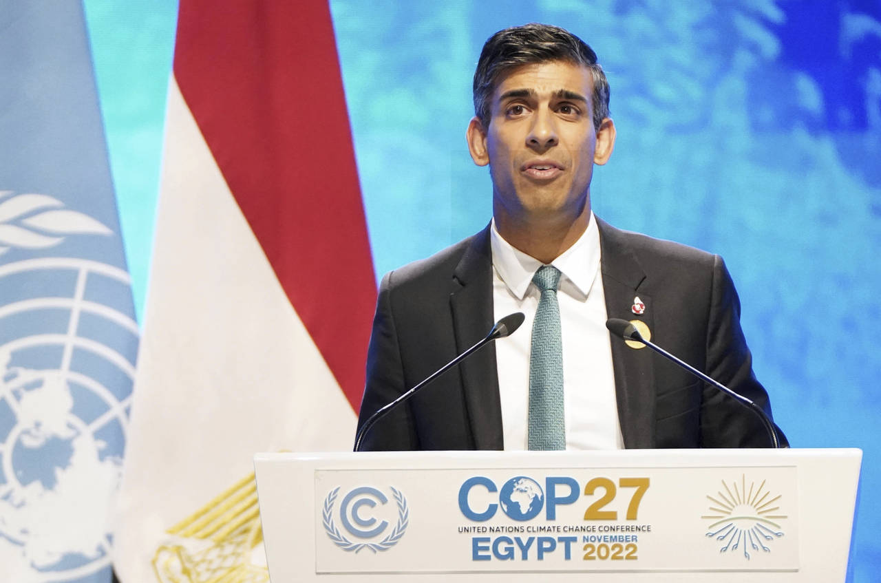 Britain's Prime Minister Rishi Sunak addresses delegates during the COP27 climate summit in Sharm e...
