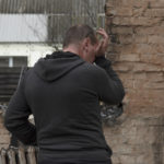 
              Vadym Zherdetsky reacts standing in the remains of his destroyed house, in the village of Moshun, outside Kyiv, Ukraine, Friday, Nov. 4, 2022. (AP Photo/Andrew Kravchenko)
            