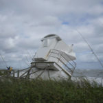 
              A lifeguard stand is displaced up onto a dune following the passage of Hurricane Nicole, Thursday, Nov. 10, 2022, in Vero Beach, Fla. (AP Photo/Rebecca Blackwell)
            