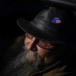 
              Charles Powers sits in his car with his "I Voted" sticker on his hat after voting at his polling place, the New LIFE Worship Center Church of God in Fayetteville, Pa., Tuesday, Nov. 8, 2022. (AP Photo/Carolyn Kaster)
            