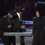 
              Janet Jackson, right, introduces inductees Terry Lewis, left, and Jimmy Jam during the Rock & Roll Hall of Fame Induction Ceremony on Saturday, Nov. 5, 2022, at the Microsoft Theater in Los Angeles. (AP Photo/Chris Pizzello)
            