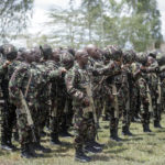 
              Members of the Kenya Defence Forces (KDF) take part in a flag-handover ceremony, ahead of a future deployment to eastern Congo as part of the newly-created East African Community Regional Force (EACRF), at the Embakasi garrison in Nairobi, Kenya Wednesday, Nov. 2, 2022. Kenya is sending more than 900 military personnel to eastern Congo to join a new regional force trying to calm deadly tensions fueled by armed groups that have led to a diplomatic crisis between Congo and neighboring Rwanda. (AP Photo/Brian Inganga)
            