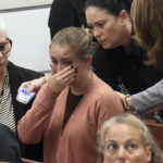 
              Meghan Petty is comforted as she takes a break from giving her victim impact statement during the sentencing hearing for Marjory Stoneman Douglas High School shooter Nikolas Cruz at the Broward County Courthouse in Fort Lauderdale, Fla., on Tuesday, Nov. 1, 2022. Petty's sister, Alaina, was killed in the 2018 shooting Cruz was sentenced to life in prison for murdering 17 people at Parkland's Marjory Stoneman Douglas High School more than four years ago. (Amy Beth Bennett/South Florida Sun Sentinel via AP, Pool)
            