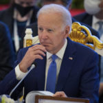 
              U.S. President Joe Biden listens to a speech from Cambodian Prime Minister Hun Sen during the ASEAN - U.S. summit in Phnom Penh, Cambodia, Saturday, Nov. 12, 2022. (AP Photo/Vincent Thian)
            