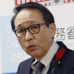 
              Japanese Justice Minister Yasuhiro Hanashi speaks during a press conference at his ministry in Tokyo, on Oct. 14, 2022. Japanese Prime Minister Fumio Kishida has decided to delay his departure Friday to southeast Asia to attend triple summits, apparently to sack his justice minister over his remark that his job makes news only when he signs executions.(Kyodo News via AP)
            