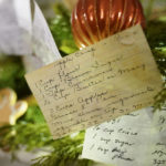 
              A copy of first lady Jill Biden's apple crisp recipe card decorates a fireplace mantel in the China Room of the White House during a press preview of holiday decorations at the White House, Monday, Nov. 28, 2022, in Washington. (AP Photo/Patrick Semansky)
            