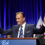 
              Los Angeles mayoral candidate Rick Caruso gives a thumbs-up to the crowd in his election-night headquarters Tuesday, Nov. 8, 2022, in Los Angeles. (AP Photo/Marcio Jose Sanchez)
            