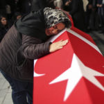 
              Relatives and friends of Arzu Ozsoy and her 15-year-old daughter Yagmur Ucar, who died in Sunday's explosion occurred on Istiklal avenue, attend their funeral in Istanbul, Turkey, Monday, Nov. 14, 2022. Turkish police said Monday that they have detained a Syrian woman with suspected links to Kurdish militants and that she confessed to planting a bomb that exploded on a bustling pedestrian avenue in Istanbul, killing six people and wounding several dozen others. (AP Photo/Emrah Gurel)
            