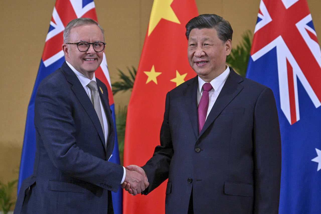 Australian Prime Minister Anthony Albanese, left, meets Chinese President Xi Jinping on the sidelin...