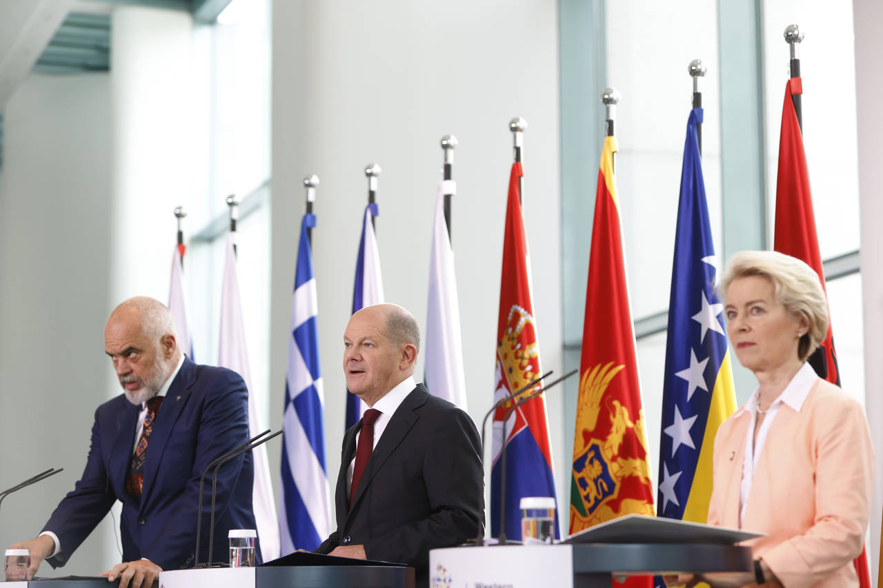From left, the Prime Minister of Albania, Edi Rama, German Chancellor Olaf Scholz and the EU Commis...