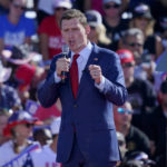 
              FILE - Senate Republican candidate Blake Masters speaks at a rally, Sunday, Oct. 9, 2022, in Mesa, Ariz. Masters lost his race against Democratic Sen. Mark Kelly. (AP Photo/Matt York, File)
            